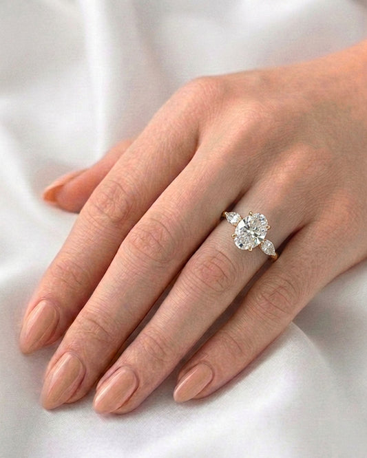 Daisy: Oval and Marquise Three-Stone Moissanite Engagement Ring