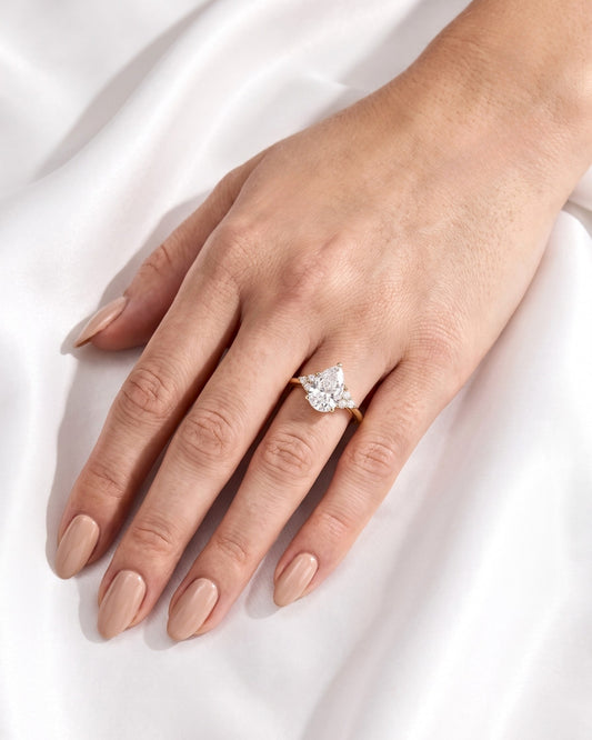 Demi: Pear Cluster Stones Moissanite Engagement Ring
