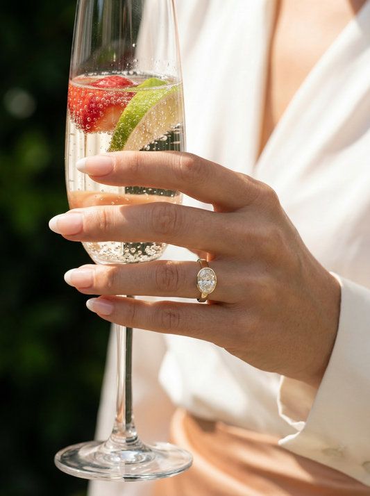 East West Bezel Oval Solitaire Diamond Engagement Ring