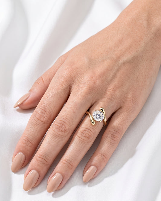Ines: Oval Solitaire with Crossover Band Moissanite Engagement Ring