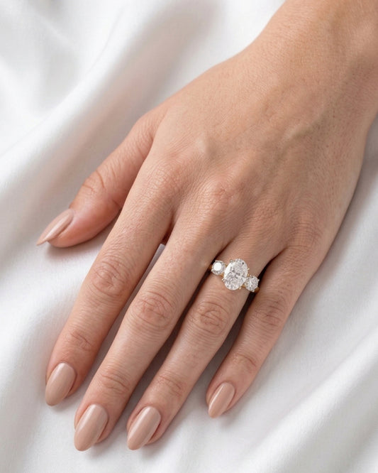 Iris - Oval Trilogy Round Setting Moissanite Engagement Ring