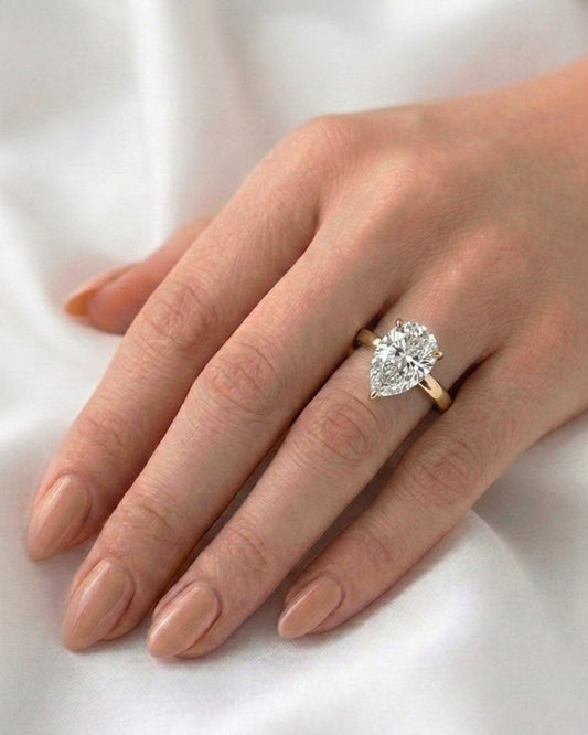 Lila: Pear Solitaire Moissanite Engagement Ring