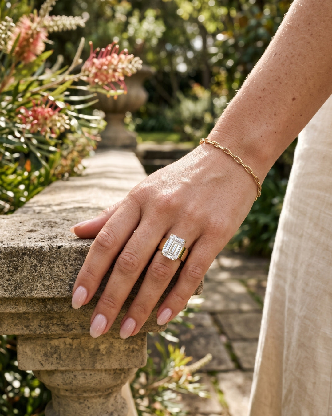 Maude: Emerald Solitaire Cigar Band Moissanite Engagement Ring