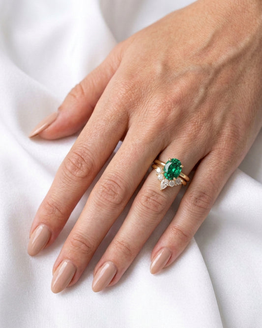 Oval Green Solitaire with Curved Cluster Wedding Band