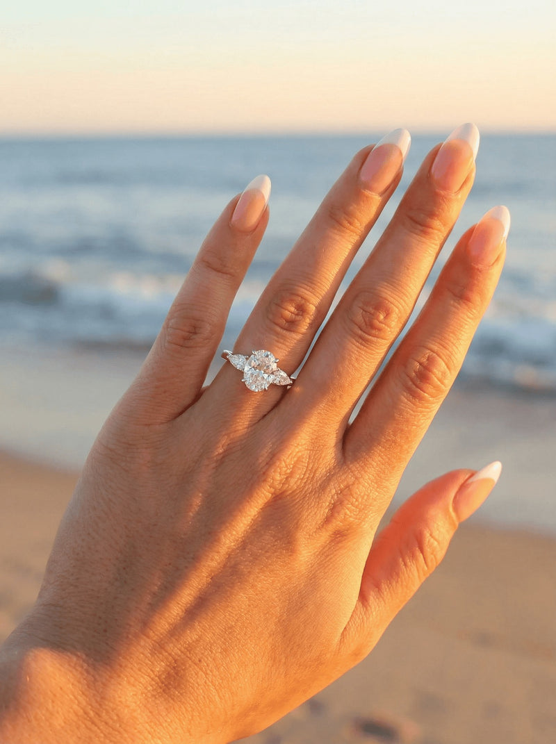 Hidden halo engagement ring on a hand