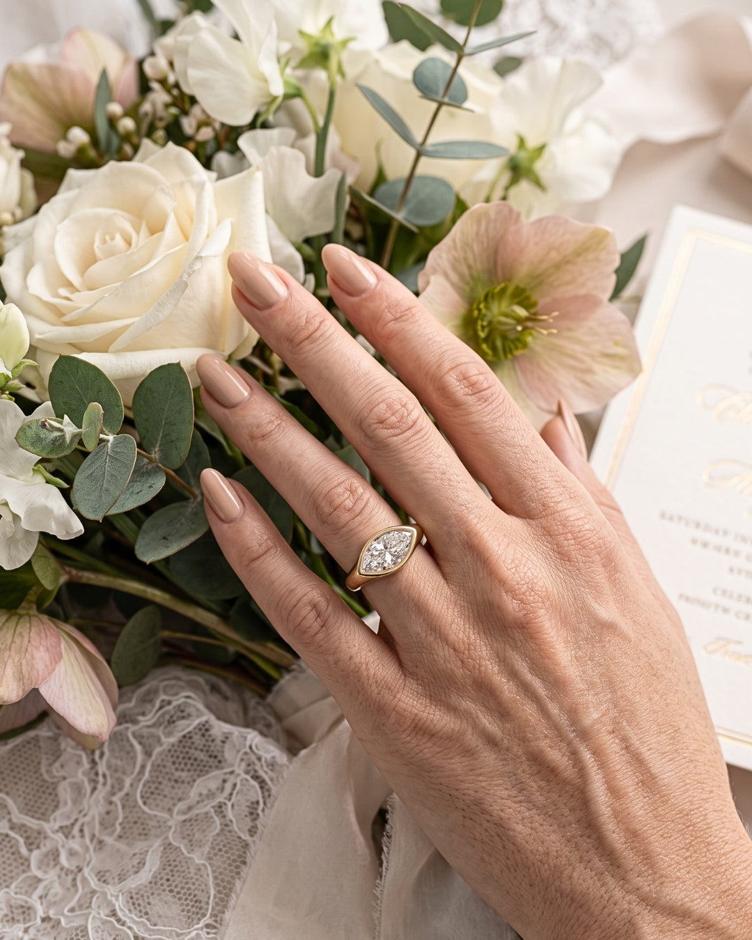Rhea: Marquise East West Bezel Solitaire with Signet Band Moissanite Engagement Ring