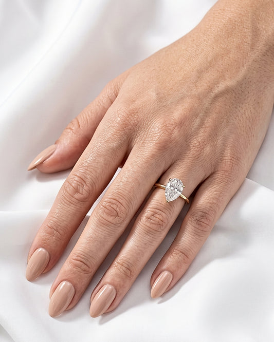 Talia: Pear Hidden Halo Moissanite Engagement Ring