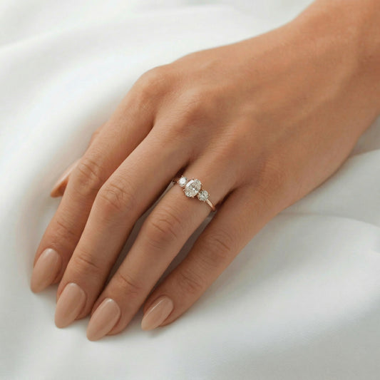 Oval Trilogy Round Setting Diamond Engagement Ring - Moissanite Engagement Rings