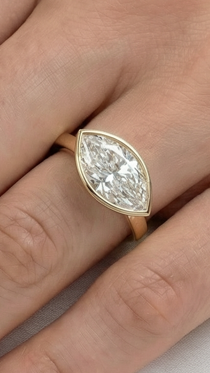 East West Bezel Marquise Solitaire Diamond Engagement Ring