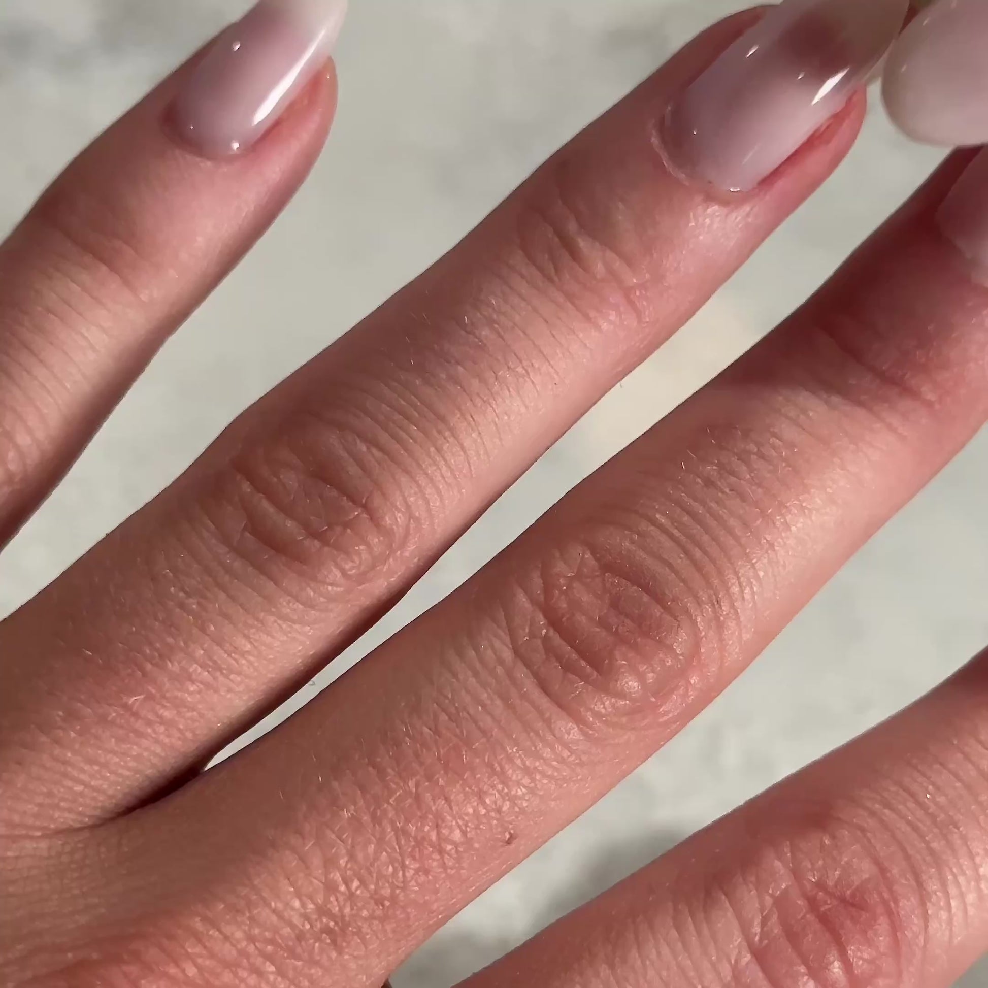 video of oval solitaire moissanite, worn on hand, sparkle highlight, elegant design, close-up angles | Moissanite Engagement Rings