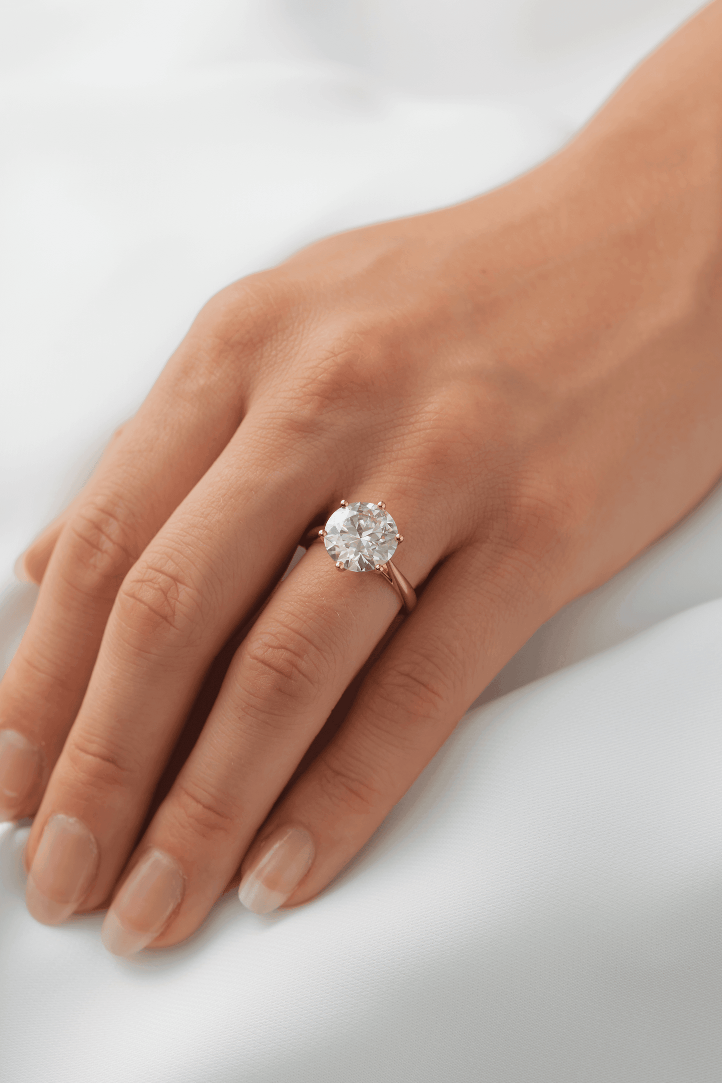 moissanite, round cut solitaire, rose gold band, engagement ring | Moissanite Engagement Rings