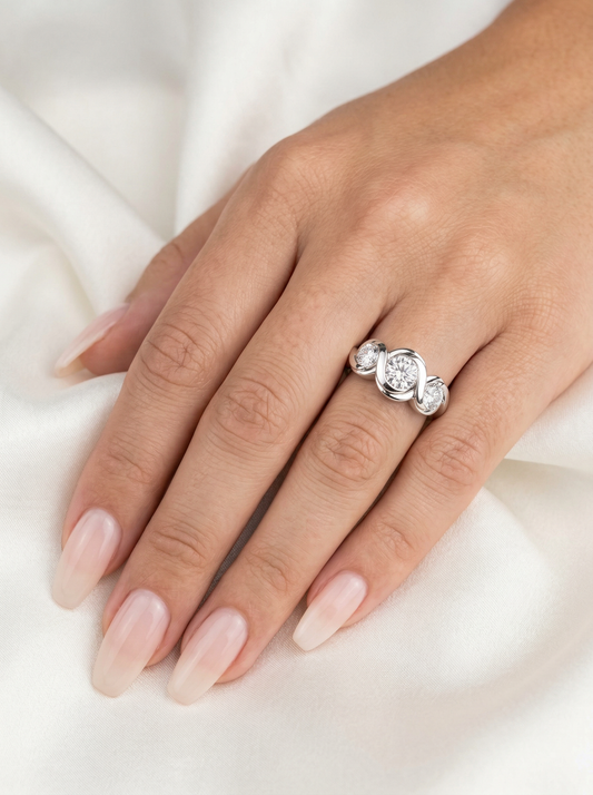 Round Trilogy Bezel Set Moissanite Engagement Ring