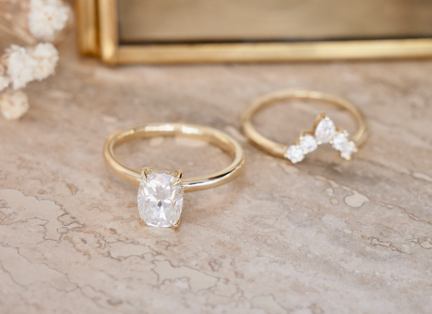How does the price of a lab grown diamond engagement ring compare to a mined diamond engagement ring?