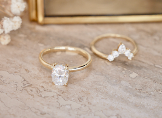 How does the price of a lab grown diamond engagement ring compare to a mined diamond engagement ring?