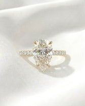 Anya: Pear Half Pavé Hidden Halo Moissanite Engagement Ring