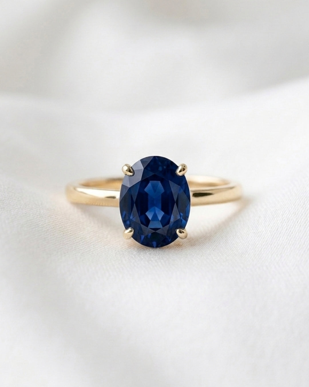 Aurora: Oval Blue Solitaire Moissanite Engagement Ring