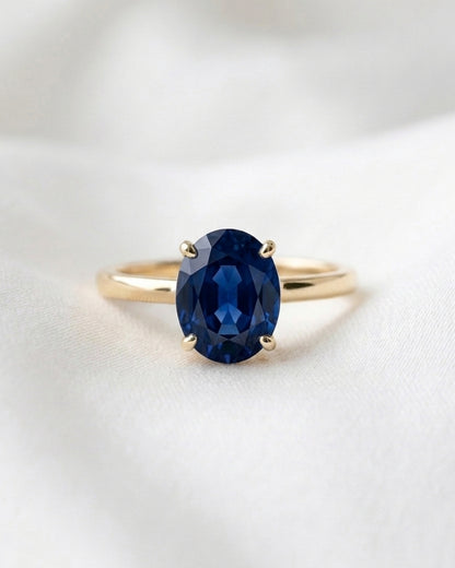 Aurora: Oval Blue Solitaire Moissanite Engagement Ring