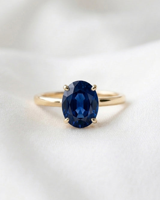 Aurora: Oval Blue Solitaire Moissanite Engagement Ring