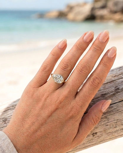 Charlie: East West Bezel Pear Solitaire Moissanite Engagement Ring