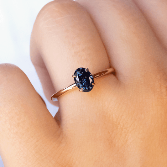 Oval Blue Solitaire Engagement Ring - moissaniteengagementrings