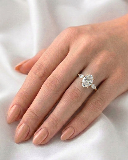 Daisy: Oval and Marquise Three-Stone Moissanite Engagement Ring