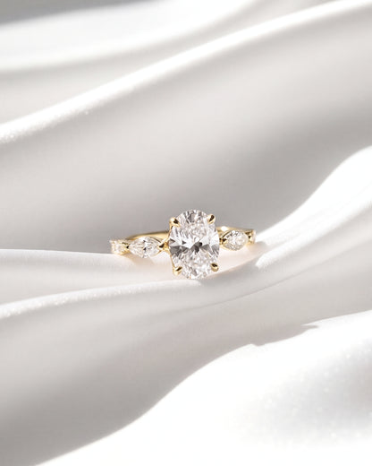 Daisy: Oval and Marquise Three-Stone Moissanite Engagement Ring