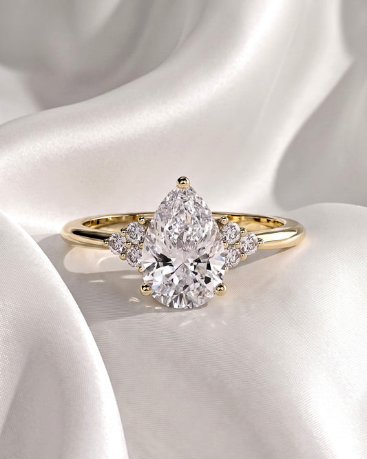 Demi: Pear Cluster Stones Moissanite Engagement Ring