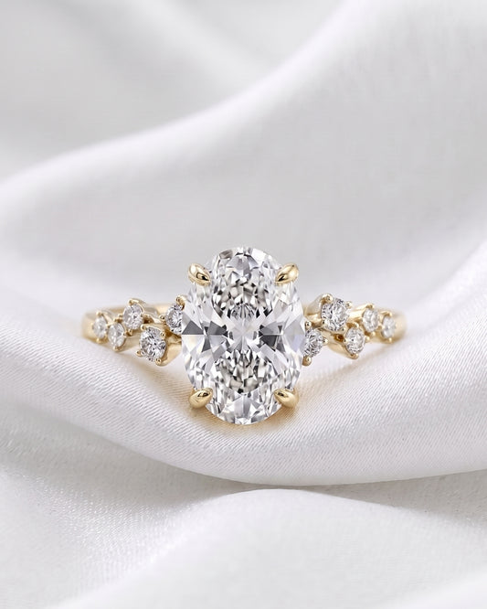 Frankie: Oval Side Stone Moissanite Engagement Ring