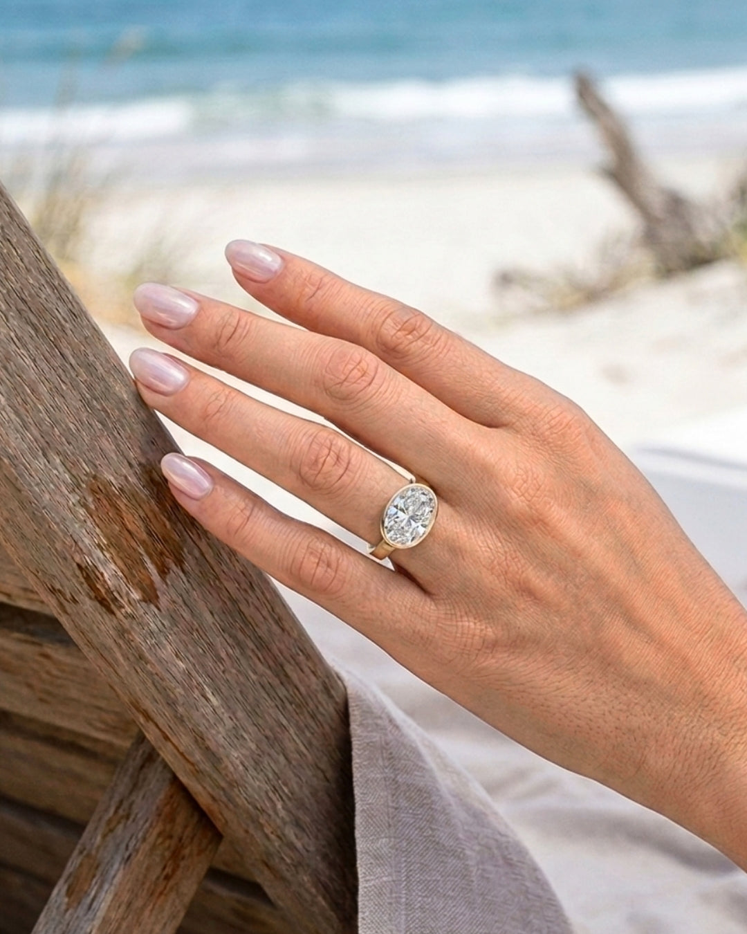 Hattie: East West Bezel Oval Solitaire Moissanite Engagement Ring