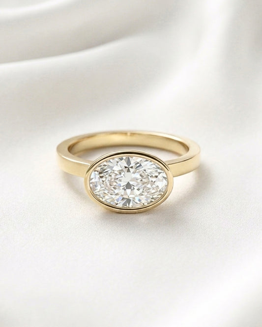 Hattie: East West Bezel Oval Solitaire Diamond Engagement Ring