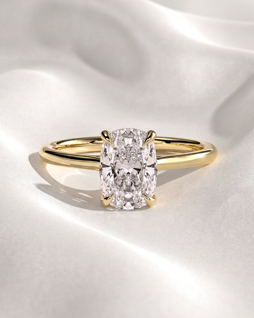 Hazel: Elongated Cushion Solitaire Moissanite Engagement Ring