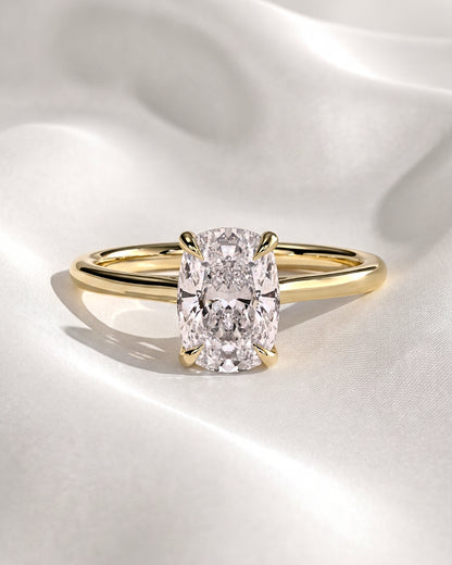 Hazel: Elongated Cushion Solitaire Moissanite Engagement Ring