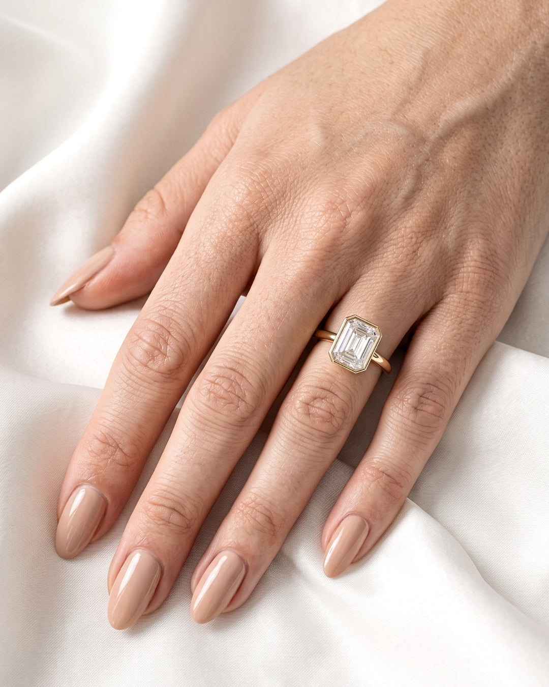 Hilda: Emerald Bezel Solitaire Moissanite Engagement Ring