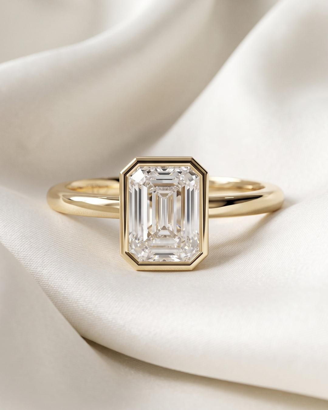Hilda: Emerald Bezel Solitaire Moissanite Engagement Ring