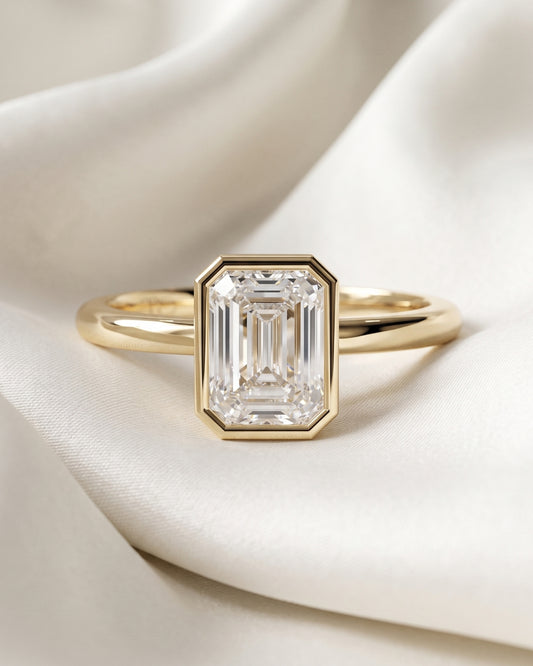 Hilda: Emerald Bezel Solitaire Moissanite Engagement Ring