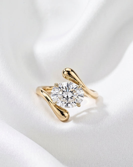 Ines: Oval Solitaire with Crossover Band Moissanite Engagement Ring