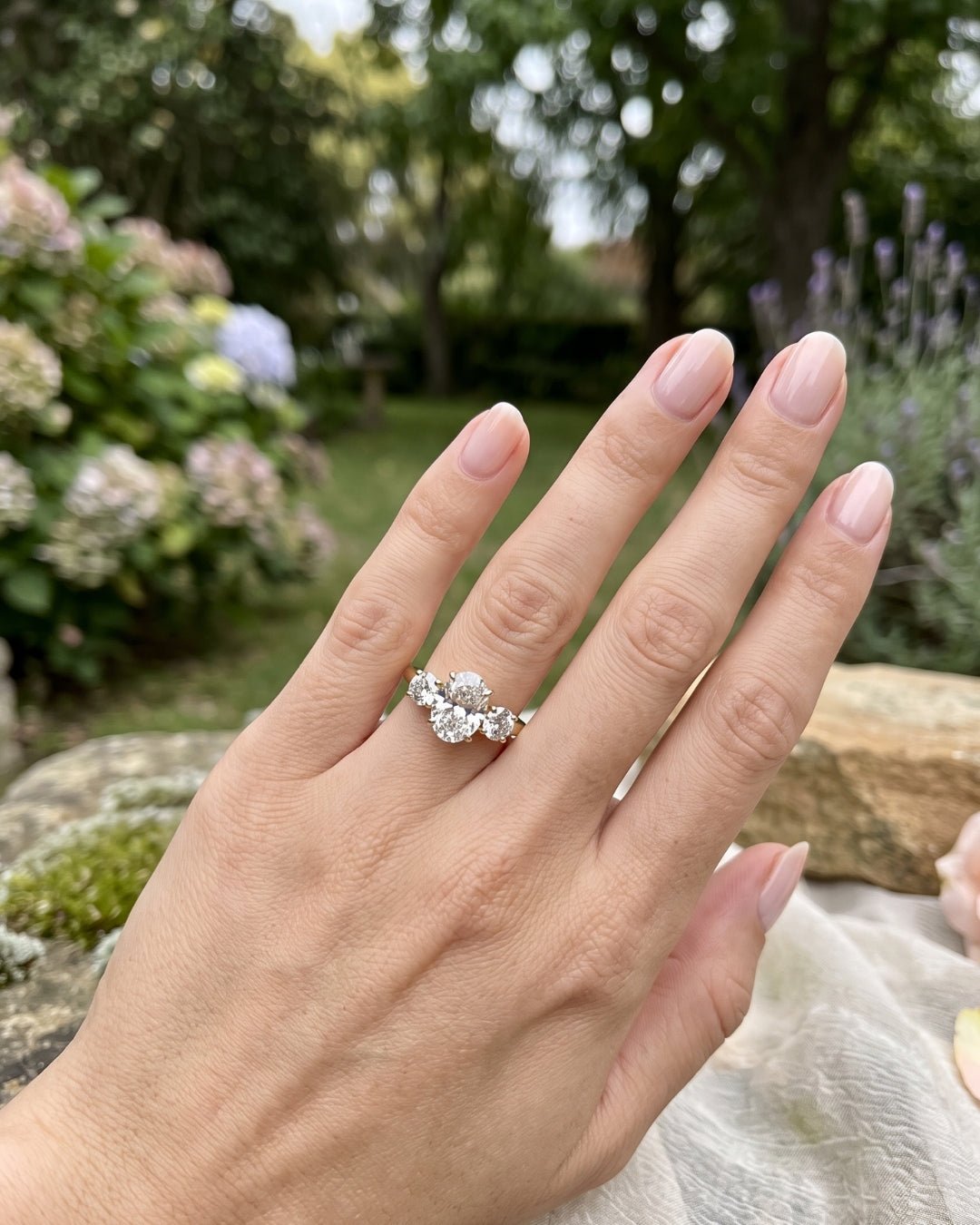 Iris - Oval Trilogy Round Setting Diamond Engagement Ring - Moissanite Engagement Rings