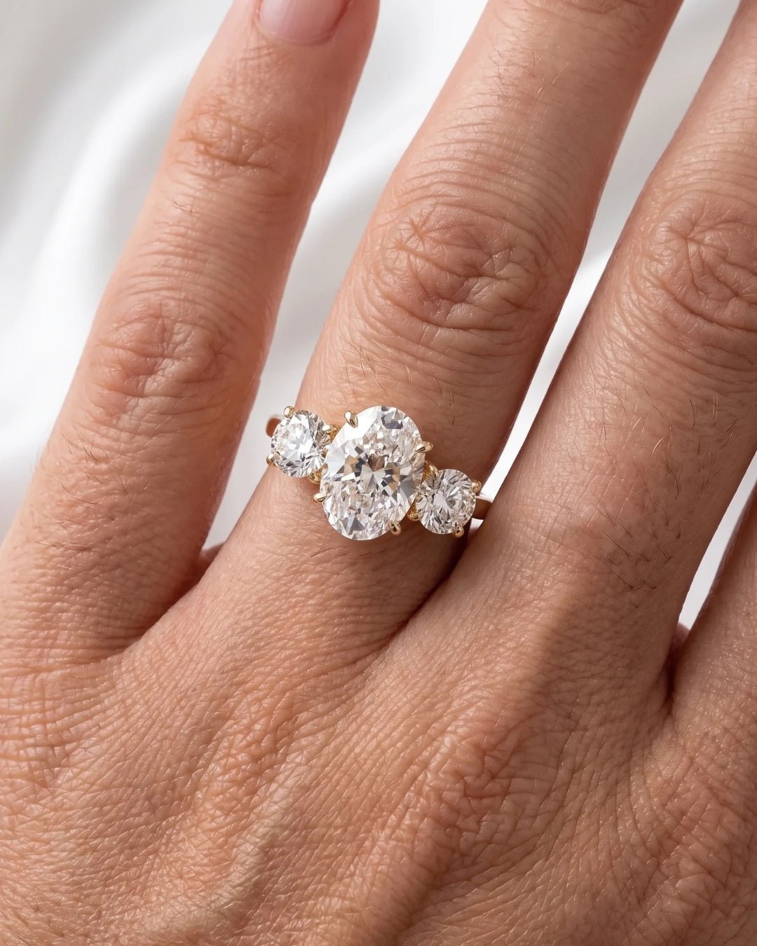 Iris - Oval Trilogy Round Setting Diamond Engagement Ring - Moissanite Engagement Rings