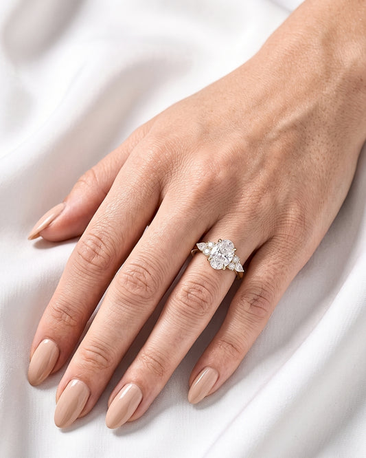 Juniper: Oval Trio Accent Stones Moissanite Engagement Ring