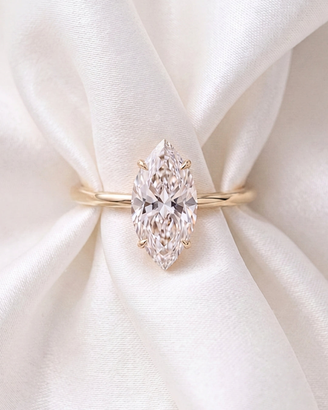 Kaia: Marquise Hidden Halo Moissanite Engagement Ring