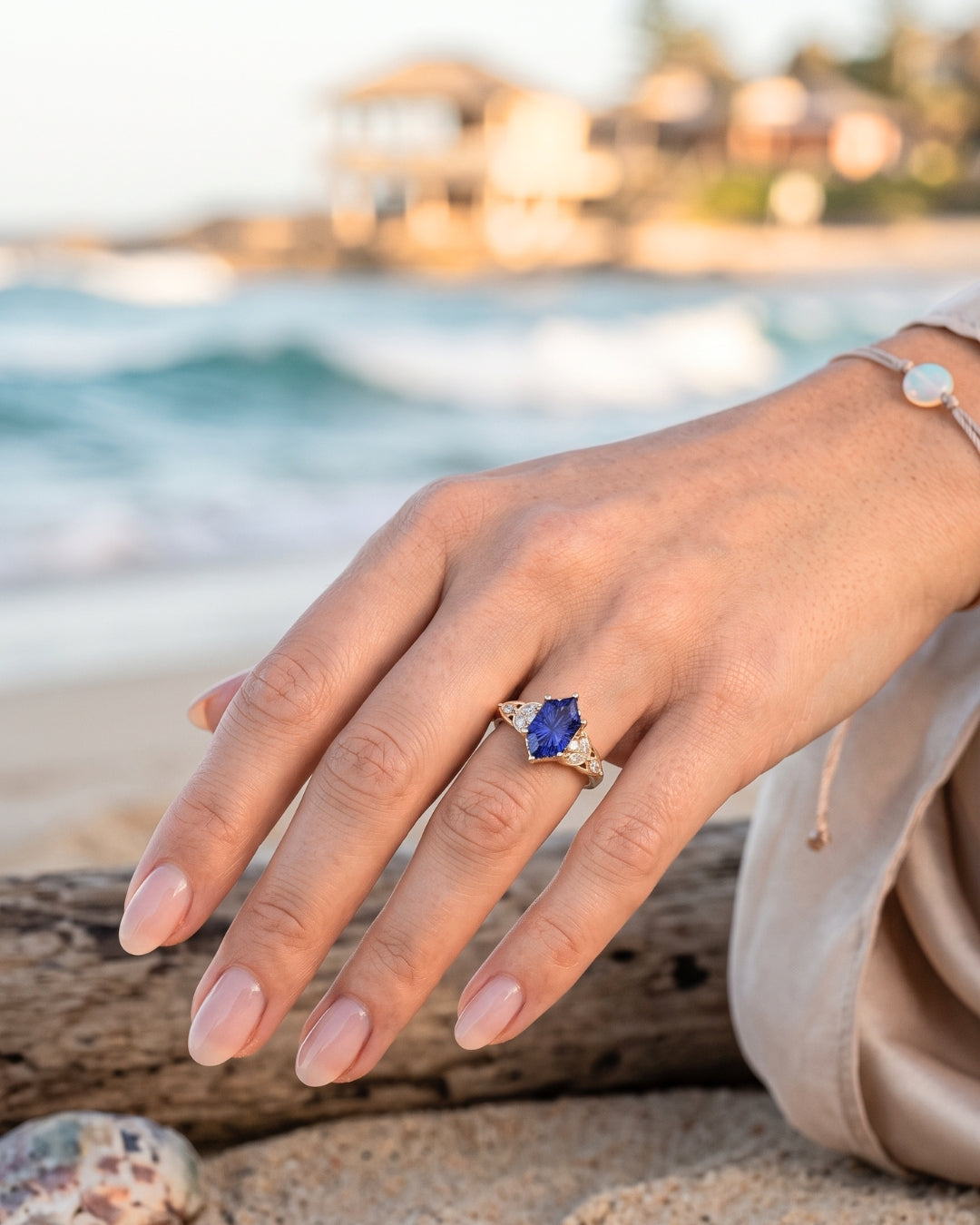 Karis: Dark Blue Sapphire with Round and Marquise Side Stones Moissanite Engagement Ring