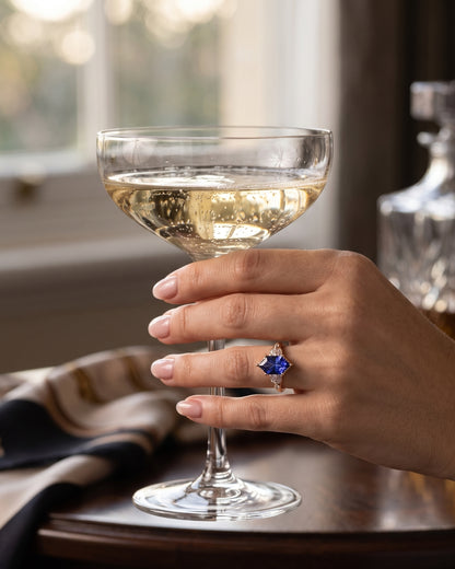Karis: Dark Blue Sapphire with Round and Marquise Side Stones Moissanite Engagement Ring