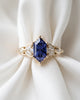 Karis: Dark Blue Sapphire with Round and Marquise Side Stones Moissanite Engagement Ring