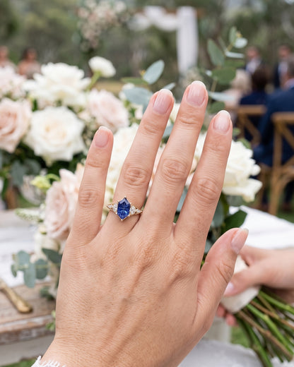 Karis: Dark Blue Sapphire with Round and Marquise Side Stones Moissanite Engagement Ring