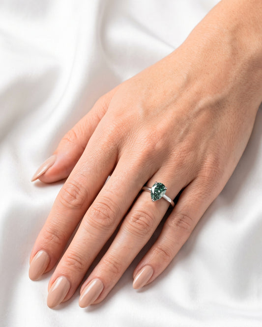 Lila: Pear Solitaire Dark Emerald Moissanite Engagement Ring