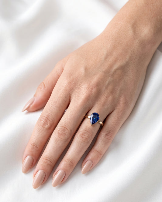 Lila: Pear Solitaire Blue Diamond Engagement Ring