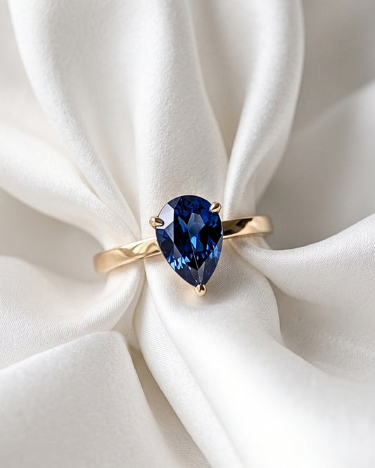 Lila: Pear Solitaire Blue Diamond Engagement Ring