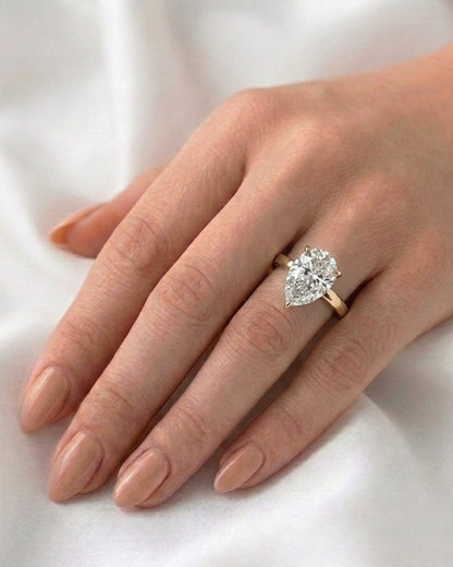 Lila: Pear Solitaire Moissanite Engagement Ring