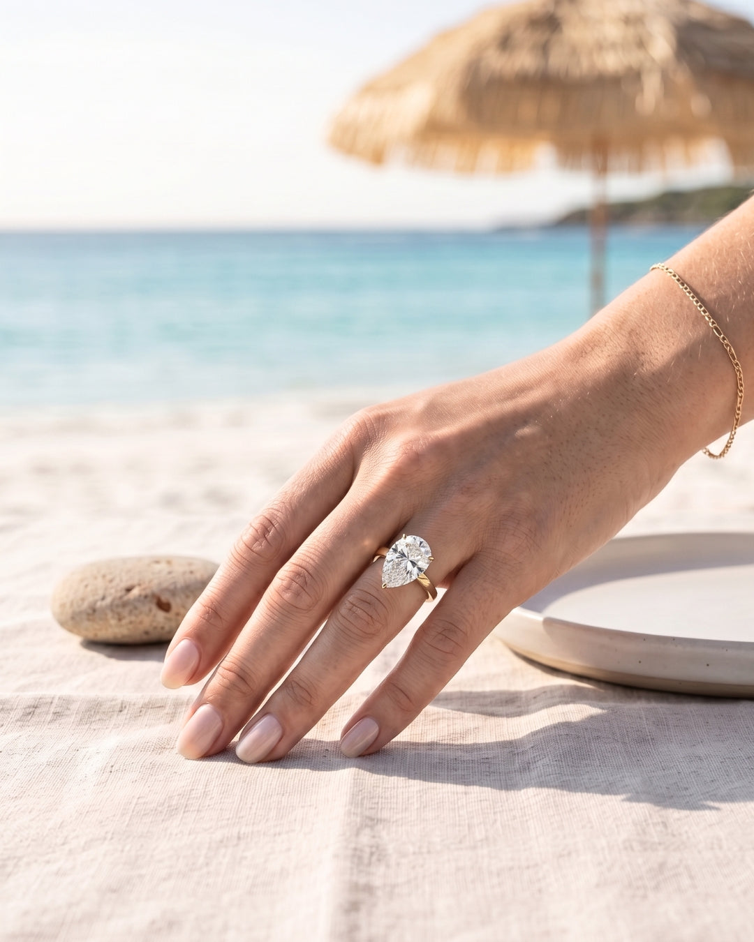 Lila: Pear Solitaire Moissanite Engagement Ring