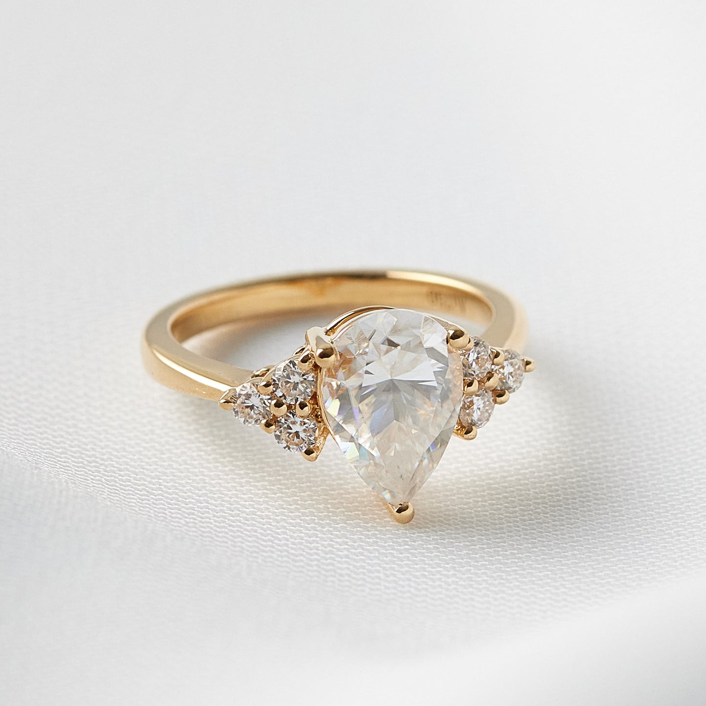Pear Cut With Cluster Stones Diamond Ring